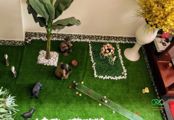 Thi công tiểu cảnh sân vườn với cỏ nhân tạo