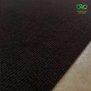 Thảm nỉ màu đen có sọc gân